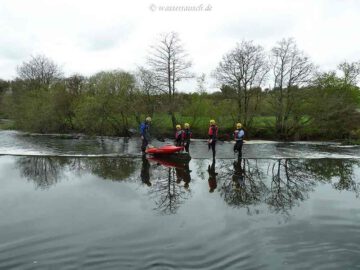 Brave kayakers at the Clasganna Weir
