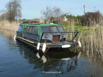 Self-build boat on the shore